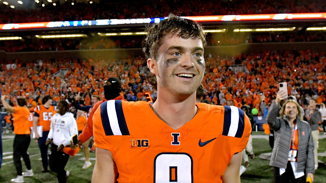 Sep 7, 2024; Champaign, Illinois, USA; Illinois Fighting Illini quarterback Luke Altmyer (9) celebrates a win over the Kansas Jayhawks at Memorial Stadium. Mandatory Credit: Ron Johnson-Imagn Images