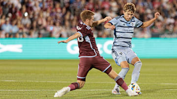 Sporting Kansas City midfielder Jake Davis (17) controls the ball against Colorado Rapids midfielder Connor Ronan (20) during the second half at Dick's Sporting Goods Park 