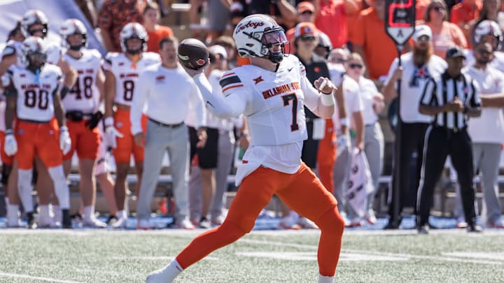 Sep 14, 2024; Tulsa, Oklahoma, USA;  Oklahoma State Cowboys quarterback Alan Bowman (7) throws a pass against the Tulsa Golden Hurricane during a game at Skelly Field at H.A. Chapman Stadium. Mandatory Credit: Brett Rojo-Imagn Images