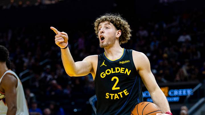 San Francisco, California, USA; Golden State Warriors guard Brandin Podziemski (2) reacts after he is called for a foul against a Phoenix Suns player during the fourth quarter at Chase Center. Mandatory Credit: John Hefti-Imagn Images