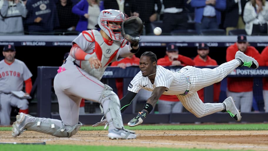 New York Yankees second baseman Jazz Chisholm Jr. (13) scores the game winning run of Game 2 of 2025 wild-card series.