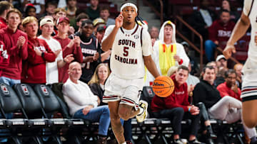 Nov 12, 2025; Columbia, South Carolina, USA; South Carolina Gamecocks guard Meechie Johnson (5) brings the ball up against the Presbyterian Blue Hose in the first half at Colonial Life Arena. Mandatory Credit: Jeff Blake-Imagn Images