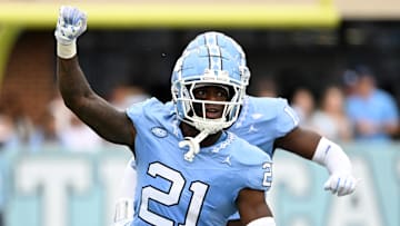 Sep 7, 2024; Chapel Hill, North Carolina, USA; North Carolina Tar Heels defensive back Kaleb Cost (21) reacts in the 1st quarter at Kenan Memorial Stadium. Mandatory Credit: Bob Donnan-Imagn Images