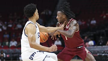Nov 9, 2024; Houston, Texas, USA; Florida State Seminoles guard Jamir Watkins (1) controls the ball as Rice Owls guard Trae Broadnax (12) defends during the first half at Toyota Center. Mandatory Credit: Troy Taormina-Imagn Images