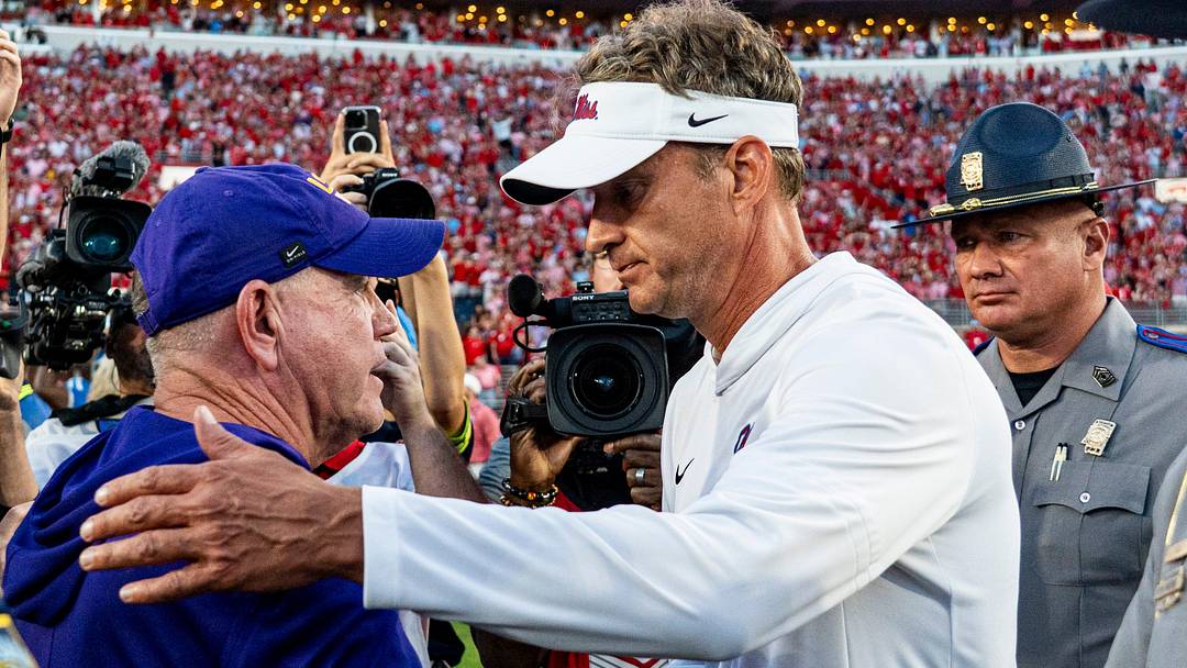 LSU head coach Brian Kelly and Ole Miss head coach Lane Kiffin shake hands after Ole Miss was defeated by LSU 24-19.