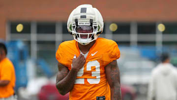 Tennessee defensive back Boo Carter (23) pulls on his jersey during Tennessee football preseason practice, in Knoxville, Tennessee, Aug. 6, 2025.