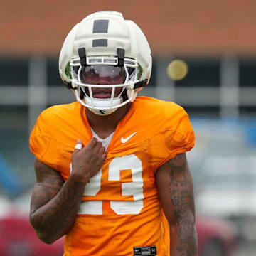 Tennessee defensive back Boo Carter (23) pulls on his jersey during Tennessee football preseason practice, in Knoxville, Tennessee, Aug. 6, 2025.