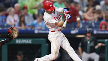 May 3, 2025; Philadelphia, Pennsylvania, USA; Philadelphia Phillies shortstop Trea Turner (7) hits a double during the fourth inning against the Arizona Diamondbacks at Citizens Bank Park. 