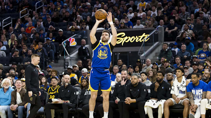 Feb 23, 2025; San Francisco, California, USA; Golden State Warriors guard Pat Spencer (61) takes a three-point shot against the Dallas Mavericks during the fourth quarter at Chase Center. Mandatory Credit: John Hefti-Imagn Images