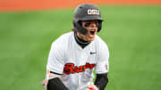 Oregon State's Travis Bazzana (37) celebrates after hitting the team's second solo home run during an NCAA college baseball game against Oregon at Goss Stadium on Friday, April 26, 2024, in Corvallis, Ore.