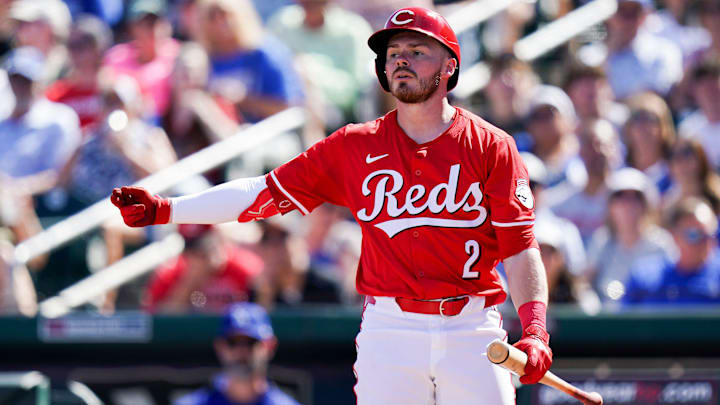 Cincinnati Reds third baseman Gavin Lux (2) reacts after missing a swing at the ball in the second inning of a Cactus League game between the Cincinnati Reds and Los Angeles Dodgers, Monday, Feb. 24, 2025, at Goodyear Ballpark in Goodyear, Ariz.