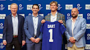 New York Giants president John Mara, GM Joe Schoen, Jaxson Dart, and head coach Brian Daboll pose with Jaxson Dart.