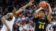 Freedom High School's Donovan Davis (24) shoots the ball against Milwaukee Academy of Science during the WIAA Division 3 state championship game on Saturday, March 22, 2025, at the Kohl Center in Madison, Wis.