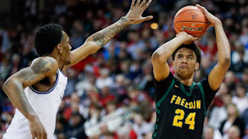 Freedom High School's Donovan Davis (24) shoots the ball against Milwaukee Academy of Science during the WIAA Division 3 state championship game on Saturday, March 22, 2025, at the Kohl Center in Madison, Wis. Milwaukee Academy of Science won the game, 57-54.
Tork Mason/USA TODAY NETWORK-Wisconsin