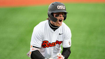 Oregon State's Travis Bazzana (37) celebrates after hitting the team's second solo home run during an NCAA college baseball game against Oregon at Goss Stadium on Friday, April 26, 2024, in Corvallis, Ore.
