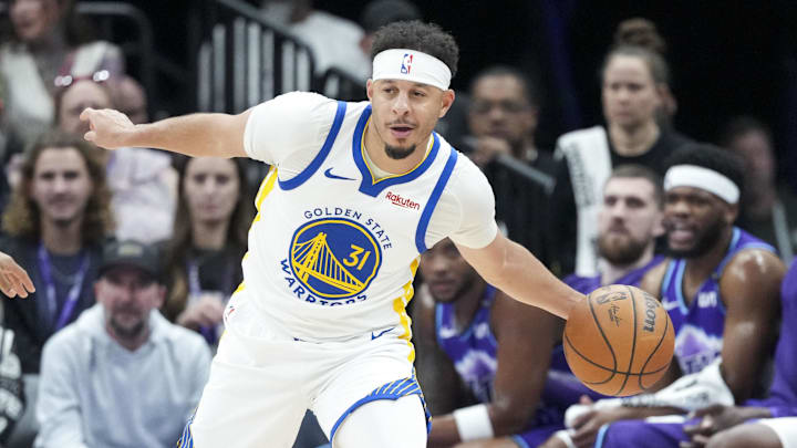Mar 9, 2026; Salt Lake City, Utah, USA; Golden State Warriors guard Seth Curry (31) reaches for a pass against Utah Jazz guard Keyonte George (3) in the second quarter as the Golden State Warriors face the Utah Jazz at Delta Center. Mandatory Credit: Gabriel Mayberry-Imagn Images