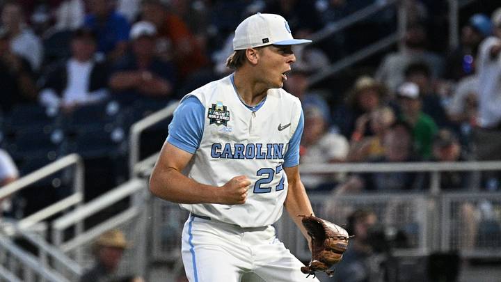 Jun 14, 2026; Omaha, NE, USA;  North Carolina Tar Heels pitcher Caden Glauber (27) reacts to the win against the West Virginia Mountaineers at Charles Schwab Field. Mandatory Credit: Steven Branscombe-Imagn Images