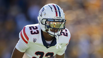 Nov 25, 2023; Tempe, Arizona, USA; An Arizona State Sun Devils player reflects in the helmet visor of Arizona Wildcats cornerback Tacario Davis (23) in the first half of the Territorial Cup at Mountain America Stadium. Mandatory Credit: Mark J. Rebilas-USA TODAY Sports