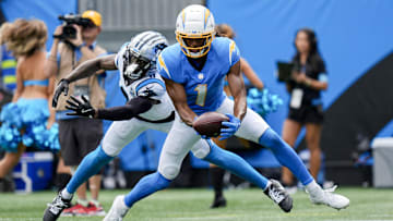 Sep 15, 2024; Charlotte, North Carolina, USA;  Los Angeles Chargers wide receiver Quentin Johnston (1) makes a touchdown catch defended by Carolina Panthers cornerback Jaycee Horn (8) the Carolina Panthers during the first quarter at Bank of America Stadium. Mandatory Credit: Jim Dedmon-Imagn Images