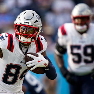 New England Patriots wide receiver Kendrick Bourne (84) runs the ball against the Tennessee Titans during the fourth quarter at Nissan Stadium in Nashville, Tenn., Sunday, Nov. 3, 2024.