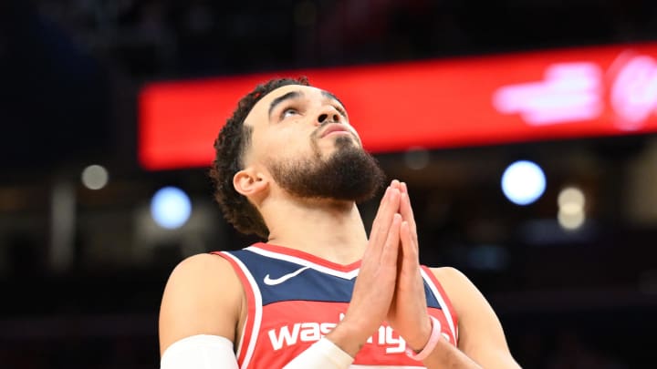 Dec 31, 2023; Washington, District of Columbia, USA;  Washington Wizards guard Tyus Jones (5) gestures during the first half against the Atlanta Hawks at Capital One Arena. Mandatory Credit: James A. Pittman-USA TODAY Sports