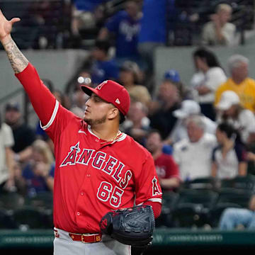 Sep 6, 2024; Arlington, Texas, USA; Los Angeles Angels pitcher José Quijada (65) reacts after final out of the game against the Texas Rangers at Globe Life Field. Mandatory Credit: Raymond Carlin III-Imagn Images