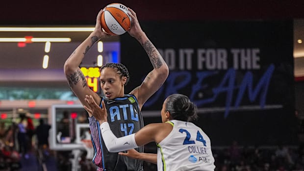 Brittney Griner being guarded by Napheesa Collier