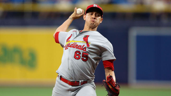 Aug 9, 2023; St. Petersburg, Florida, USA;  St. Louis Cardinals relief pitcher Giovanny Gallegos (65) throws a pitch against the Tampa Bay Rays in the ninth inning at Tropicana Field.