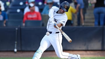 Tampa Bay Rays second baseman Brandon Lowe (8) hits a solo home run against the Miami Marlins in the seventh inning at George M. Steinbrenner Field. 