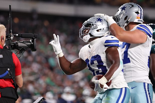 Dallas Cowboys RB Javonte Williams celebrates with his teammates after scoring a touchdown against the Philadelphia Eagles.
