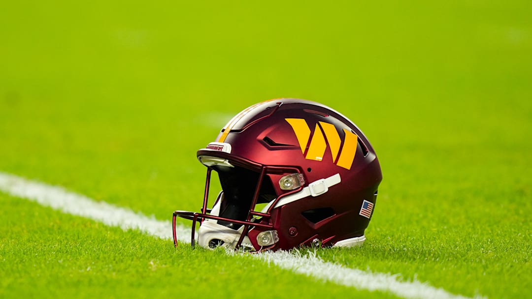 Oct 27, 2025; Kansas City, Missouri, USA; A general view of a Washington Commanders helmet on the field prior to a game against the Kansas City Chiefs at GEHA Field at Arrowhead Stadium. Mandatory Credit: Jay Biggerstaff-Imagn Images