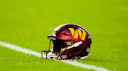 Oct 27, 2025; Kansas City, Missouri, USA; A general view of a Washington Commanders helmet on the field prior to a game against the Kansas City Chiefs at GEHA Field at Arrowhead Stadium. Mandatory Credit: Jay Biggerstaff-Imagn Images