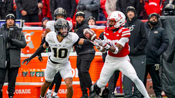 Oct 28, 2023; Lincoln, Nebraska, USA; Purdue Boilermakers defensive back Cam Allen (10) breaks up a pass to Nebraska Cornhuskers wide receiver Jaidyn Doss (85) during the first quarter at Memorial Stadium. Mandatory Credit: Dylan Widger-Imagn Images