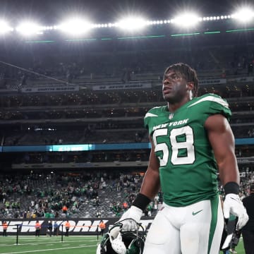 Oct 15, 2023; East Rutherford, New Jersey, USA; New York Jets defensive end Carl Lawson (58) on the field after defeating the Philadelphia Eagles at MetLife Stadium. Mandatory Credit: Vincent Carchietta-USA TODAY Sports