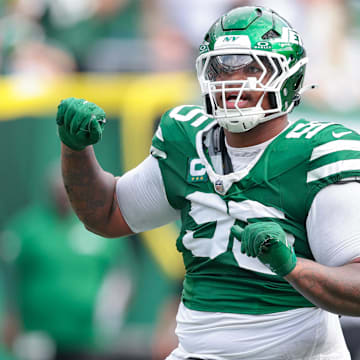 Sep 7, 2025; East Rutherford, New Jersey, USA; New York Jets defensive tackle Quinnen Williams (95) celebrates after a defensive stop during the game against the Pittsburgh Steelers at MetLife Stadium. Mandatory Credit: Vincent Carchietta-Imagn Images