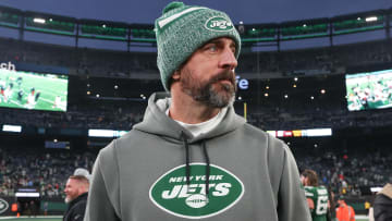 Dec 24, 2023; East Rutherford, New Jersey, USA; New York Jets quarterback Aaron Rodgers (8) on the field after the game against the Washington Commanders at MetLife Stadium. Mandatory Credit: Vincent Carchietta-USA TODAY Sports 