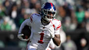 Jan 5, 2025; Philadelphia, Pennsylvania, USA; New York Giants wide receiver Malik Nabers (1) runs with the ball against the Philadelphia Eagles during the first quarter at Lincoln Financial Field. Mandatory Credit: Bill Streicher-Imagn Images