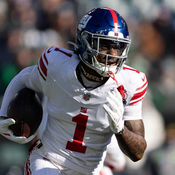 Jan 5, 2025; Philadelphia, Pennsylvania, USA; New York Giants wide receiver Malik Nabers (1) runs with the ball against the Philadelphia Eagles during the first quarter at Lincoln Financial Field. Mandatory Credit: Bill Streicher-Imagn Images