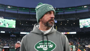 Dec 24, 2023; East Rutherford, New Jersey, USA; New York Jets quarterback Aaron Rodgers (8) on the field after the game against the Washington Commanders at MetLife Stadium. Mandatory Credit: Vincent Carchietta-USA TODAY Sports 