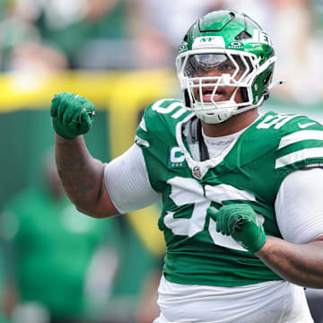 Sep 7, 2025; East Rutherford, New Jersey, USA; New York Jets defensive tackle Quinnen Williams (95) celebrates after a defensive stop during the game against the Pittsburgh Steelers at MetLife Stadium. Mandatory Credit: Vincent Carchietta-Imagn Images