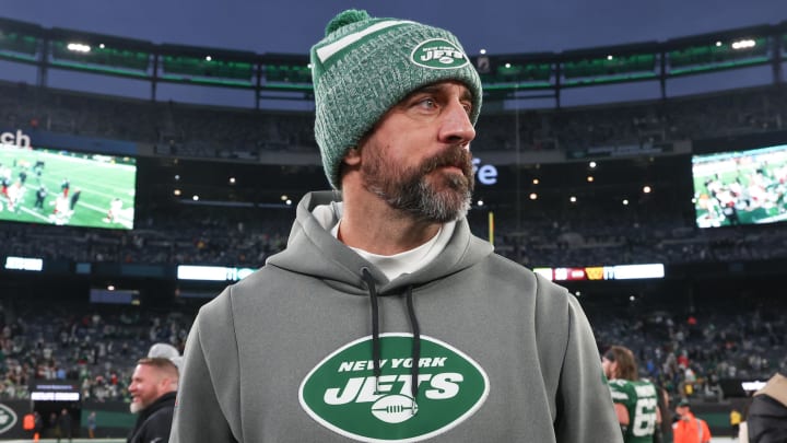 Dec 24, 2023; East Rutherford, New Jersey, USA; New York Jets quarterback Aaron Rodgers (8) on the field after the game against the Washington Commanders at MetLife Stadium.