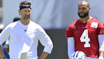  Dallas Cowboys quarterback Dak Prescott (4) talks with head coach Brian Schottenheimer during training camp at River Ridge Playing Fields in Oxnard, CA.