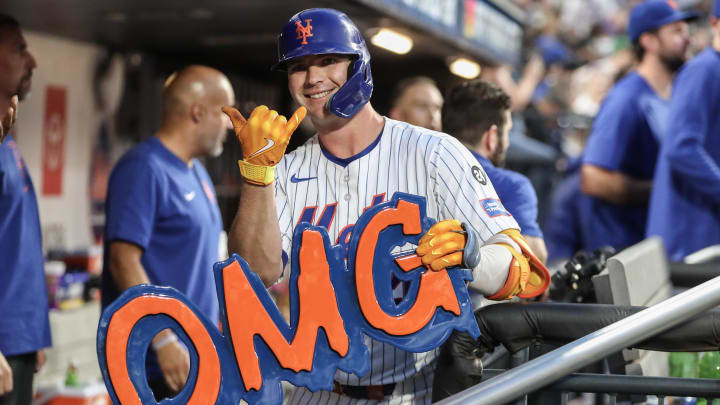 New York Mets first baseman Pete Alonso (20) celebrates in the dugout after hitting a solo home run in the fourth inning against the Minnesota Twins at Citi Field on July 29.