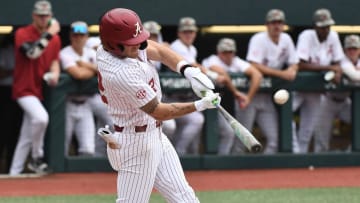 April 19, 2024; Tuscaloosa, AL, USA; Alabama hitter Gage Miller (12) connects for a home run against Texas A&M at Sewell-Thomas Stadium in the first game of a double header Friday.