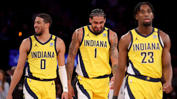 Feb 1, 2024; New York, New York, USA; Indiana Pacers guard Tyrese Haliburton (0) and forwards Obi Toppin (1) and Aaron Nesmith (23) react during the second quarter against the New York Knicks at Madison Square Garden. Mandatory Credit: Brad Penner-Imagn Images