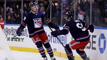 New York Rangers center Sam Carrick (39) celebrates his game winning goal against the New Jersey Devils. Mandatory Credit: Brad Penner-Imagn Images