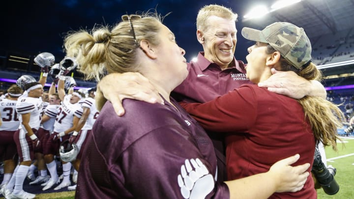  Montana Grizzlies head coach Bobby Hauck celebrates a 13-7 victory over the Huskies at Husky Stadium in 2021.