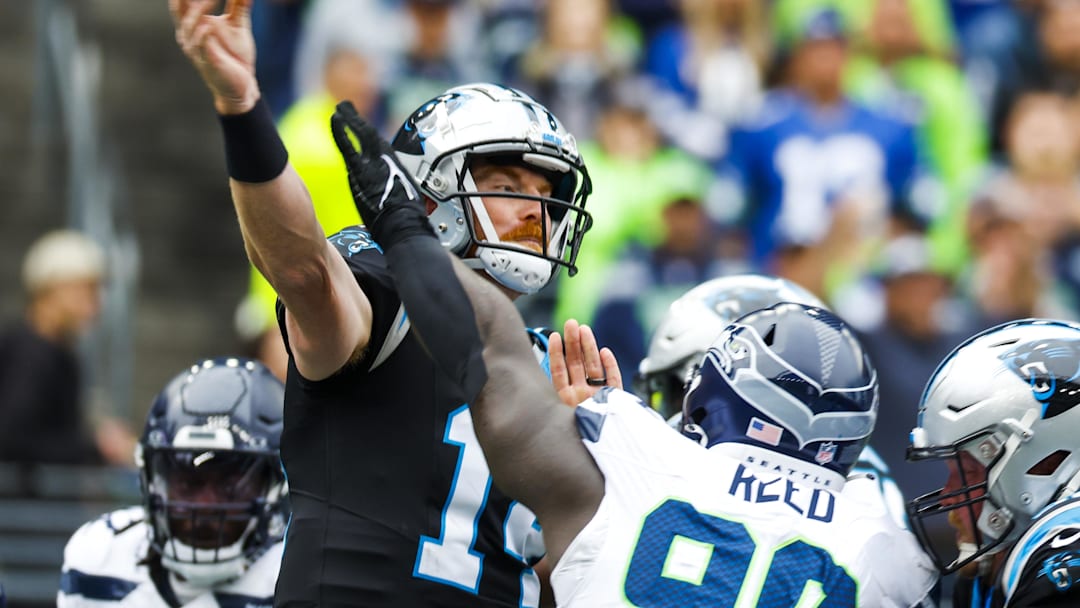 Sep 24, 2023; Seattle, Washington, USA; Carolina Panthers quarterback Andy Dalton (14) passes against the Carolina Panthers against the Seattle Seahawks during the second quarter at Lumen Field. Mandatory Credit: Joe Nicholson-Imagn Images