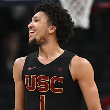 Mar 12, 2025; Indianapolis, IN, USA; USC Trojans guard Desmond Claude (1) celebrates after a play during the second half against the Rutgers Scarlet Knights at Gainbridge Fieldhouse. Mandatory Credit: Robert Goddin-Imagn Images