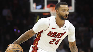 Nov 10, 2025; Miami, Florida, USA;  Miami Heat guard Norman Powell (24) brings the ball up court against the Cleveland Cavaliers during the second half at Kaseya Center. Mandatory Credit: Rhona Wise-Imagn Images